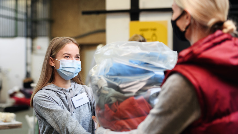 woman donating clothes