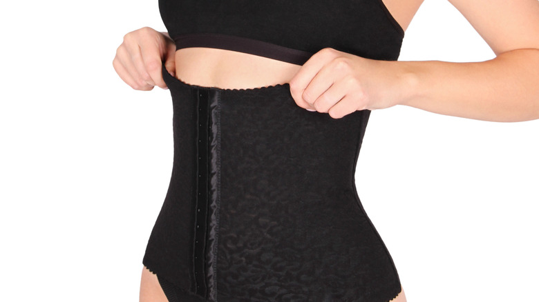 Woman wearing waist trainer