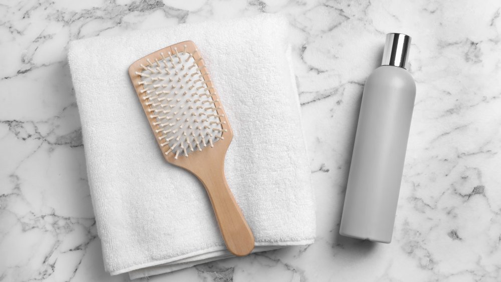 Towel, brush, and hair product