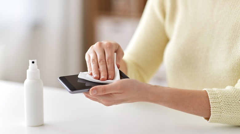 hand disinfecting cell phone