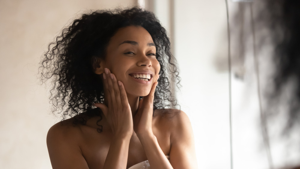 Woman happy with her skin