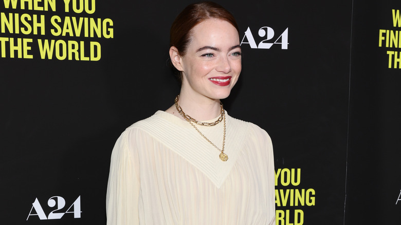 Emma Stone smiling at A24 event