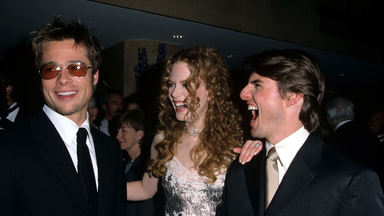 Brad Pitt Nicole Kidman and Tom Cruise posing 