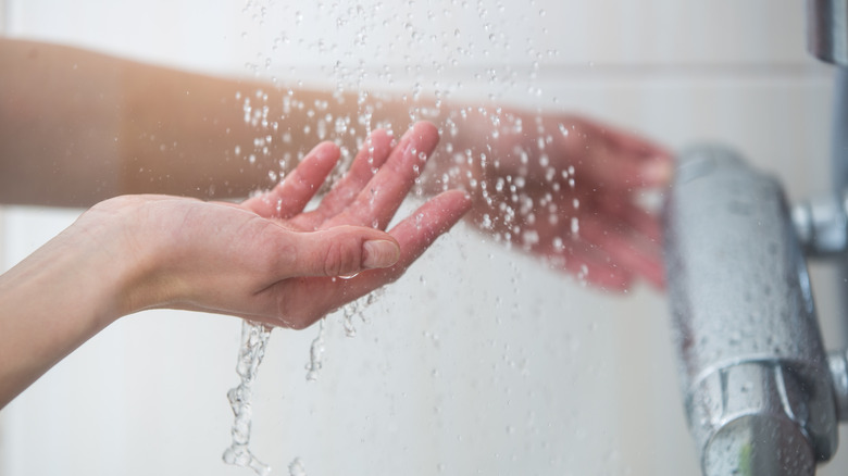 Hands in shower