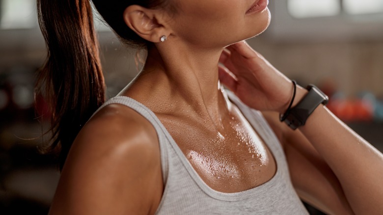 woman sweating after workout