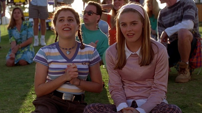 Clueless's Tai and Cher smiling