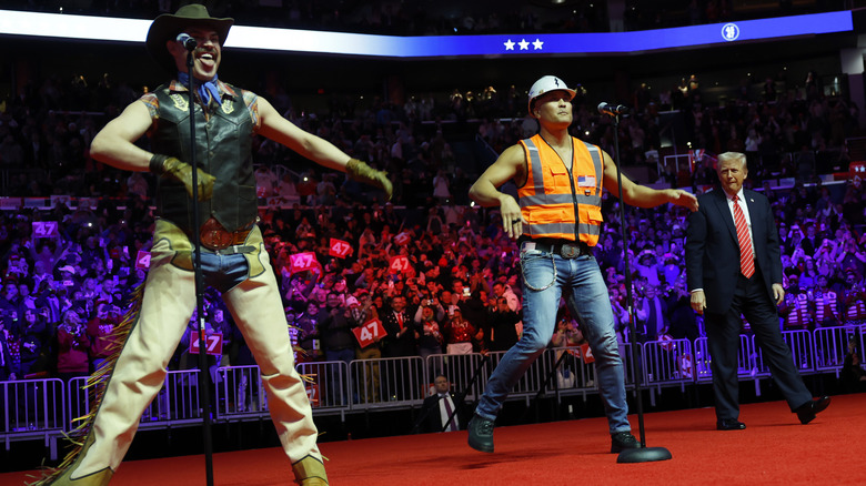 Donald Trump on stage with the Village People dancing