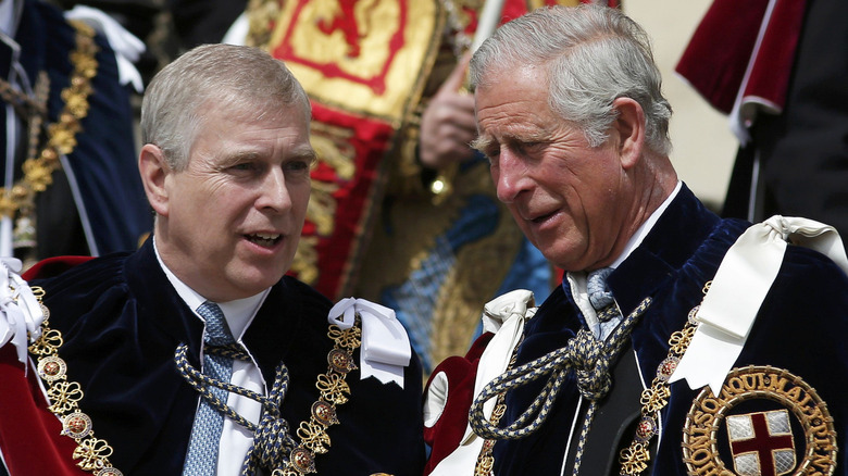 Prince Andrew and King Charles in royal regalia