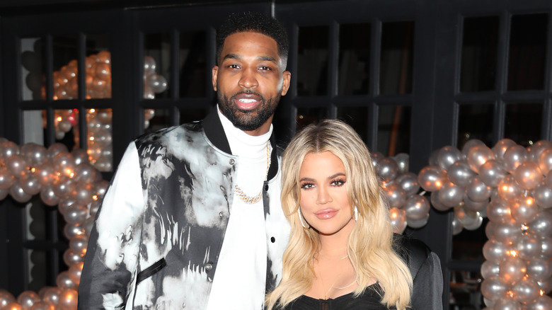 Khloe Kardashian and Tristan Thompson at an event.