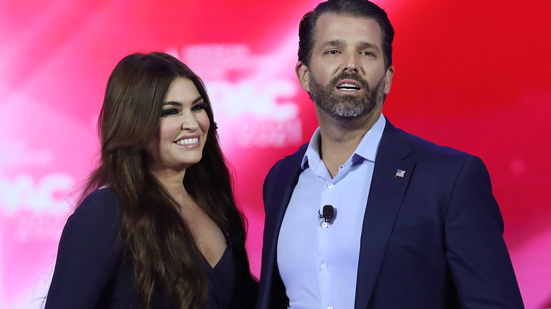 Kimberly Guilfoyle and Donald Trump Jr. smiling