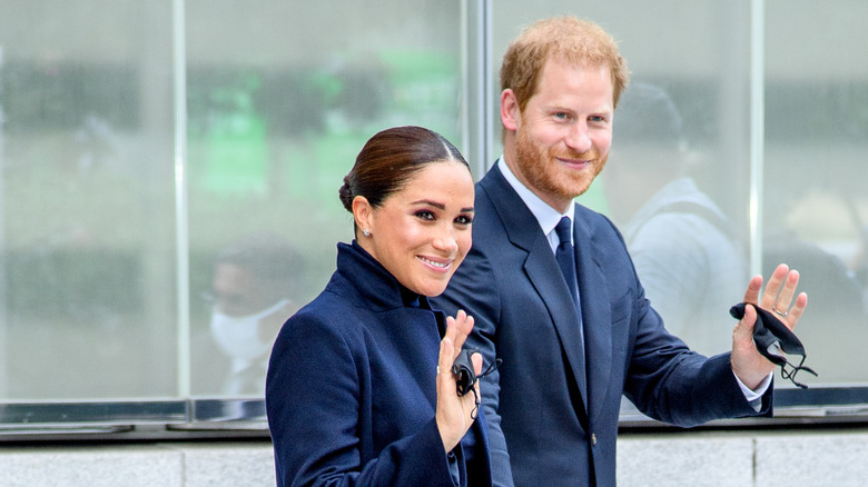 Meghan Markle and Prince Harry waving