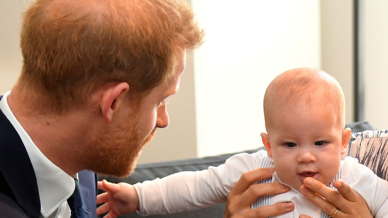 Prince Harry and Meghan Markle with son Archie. 