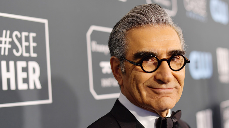 Eugene Levy smiling on the red carpet