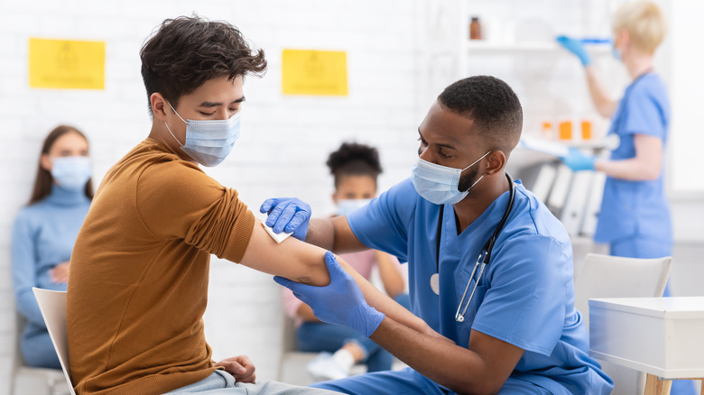 Man preparing for vaccine