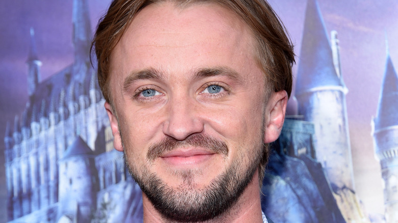 Tom Felton smiling