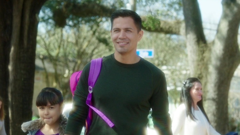 Jessie, played by Jay Hernandez, walking into the scene in Bad Moms