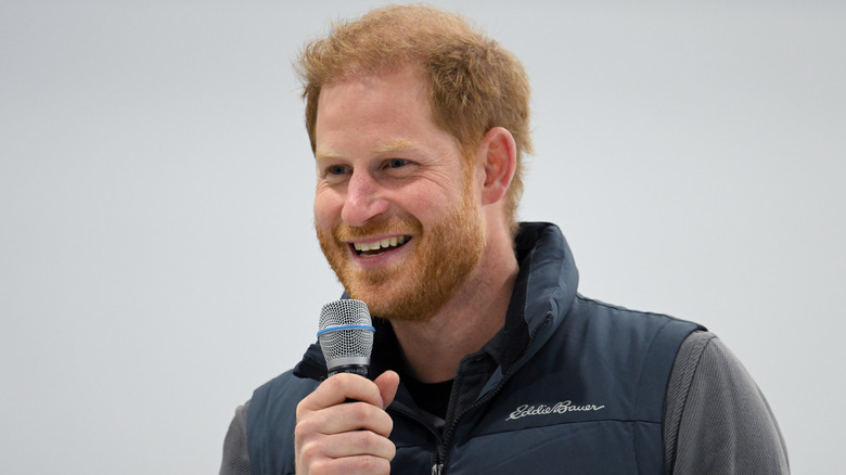 Prince Harry speaking into a microphone