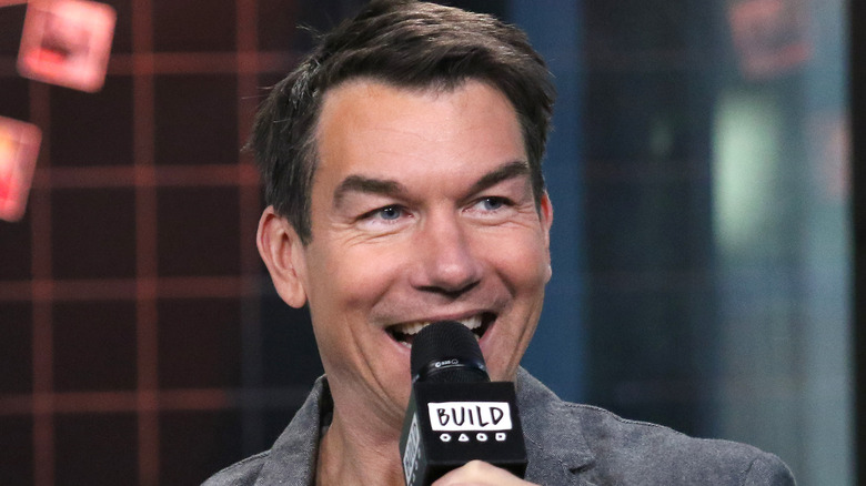 Jerry O'Connell smiling with mic