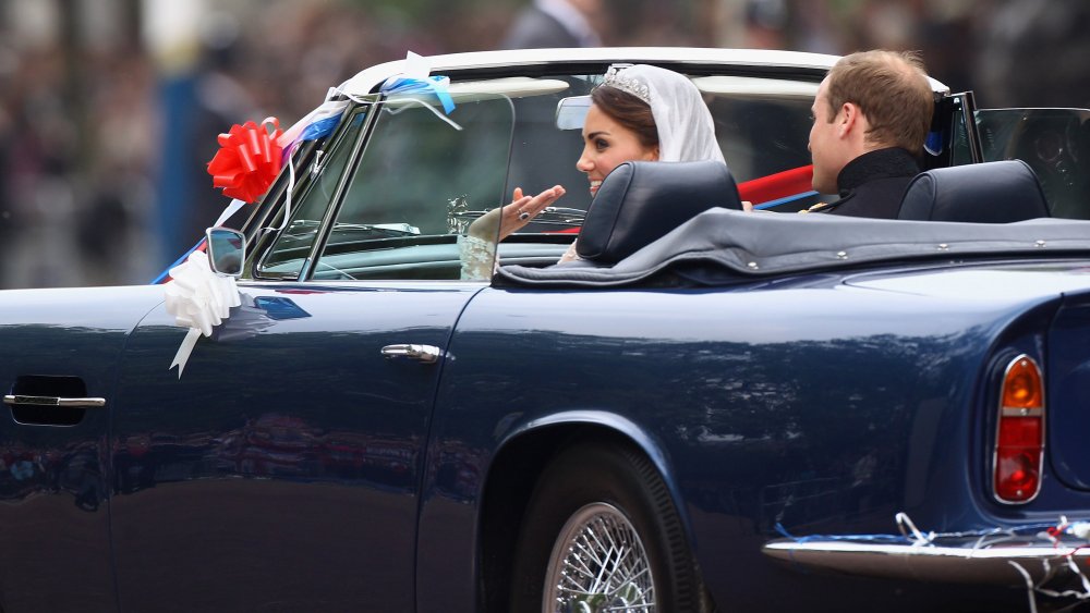 William and Kate in an expensive car on their wedding day