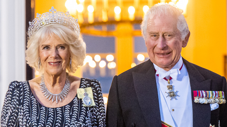 KIng Charles and Queen Camilla smiling