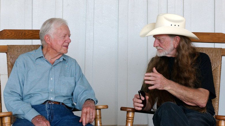 Former President Jimmy Carter and Willie Nelson chatting