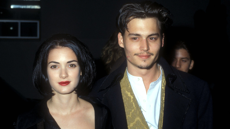 Winona Ryder. Johnny Depp smiling