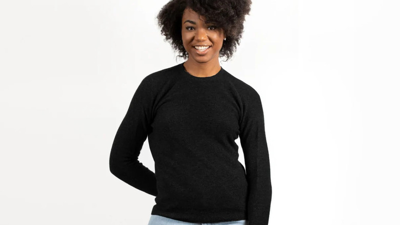 woman in black sweater