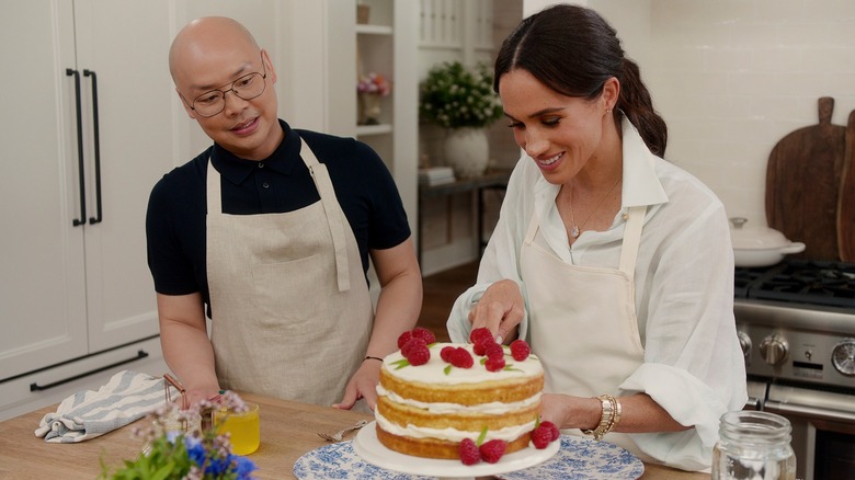 Daniel Martin and Meghan Markle cooking in "With Love, Meghan"