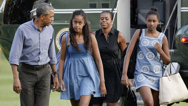 Barack and Michelle Obama with their daughters