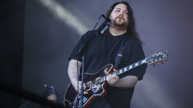 Wolfgang Van Halen playing guitar on stage