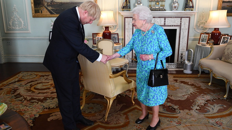 Queen Elizabeth II shaking Prime Minister Boris Johnson's hand