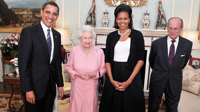 Queen Elizabeth II pictured with Barack and Michelle Obama