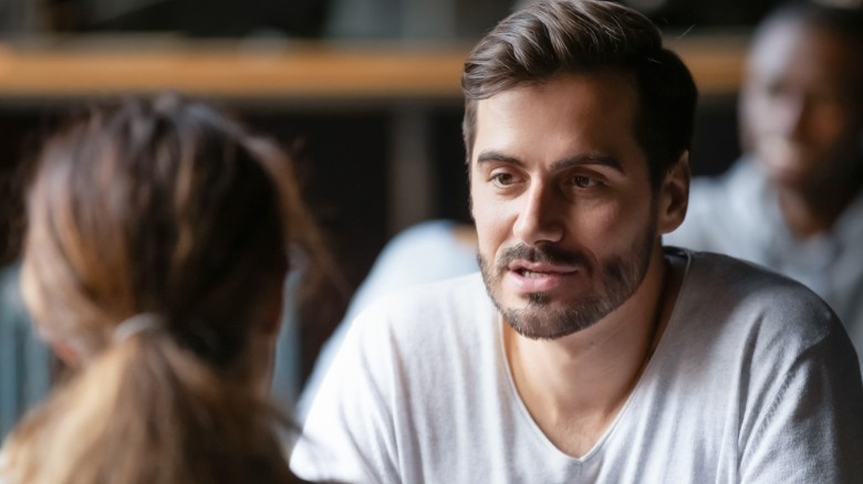 Man and woman having intense conversation