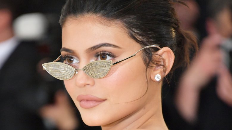 Kylie Jenner with slim sunglasses