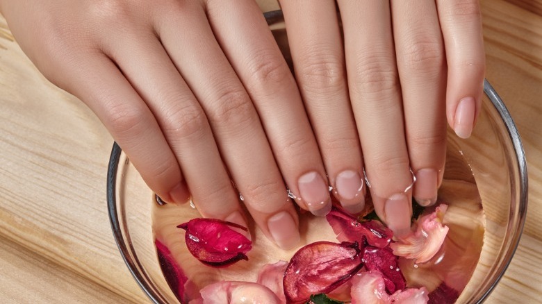 Nails soaking in rosewater