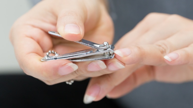 Nails being trimmed with clippers