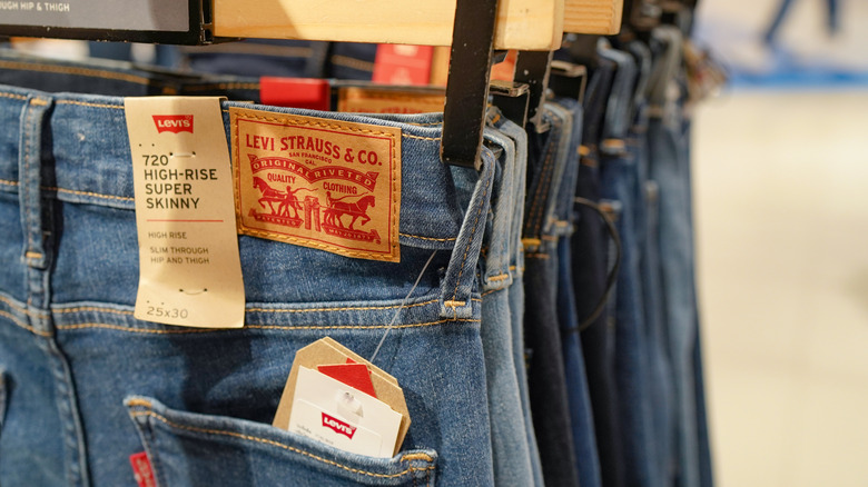 Levi Strauss jeans hanging on a rack