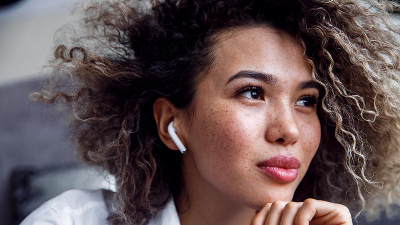 A woman wearing AirPods