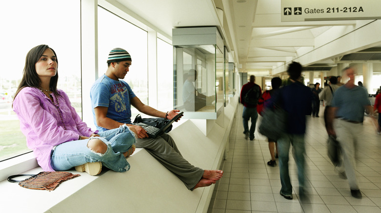 Woman and man at airport