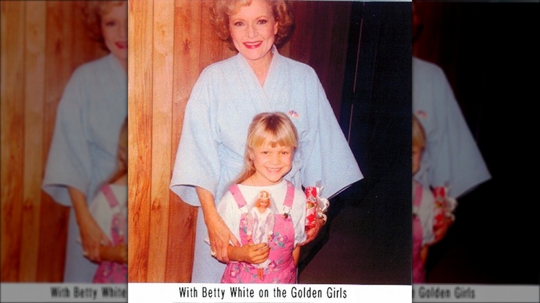 A young Ariana Richards poses with Betty White