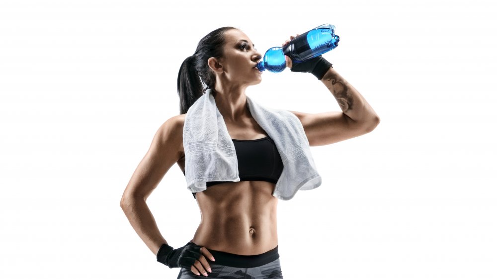 Woman drinking sports drink