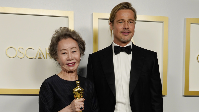 Youn posing with Brad Pitt