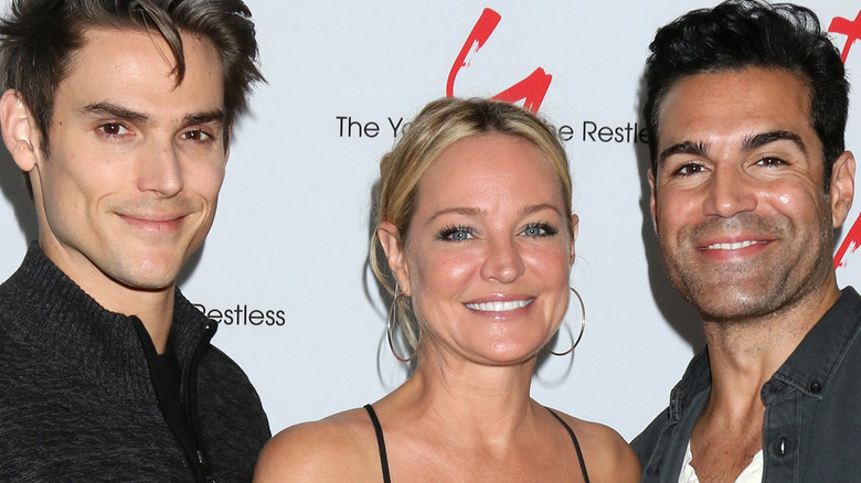 Mark Grossman, Sharon Case, and Jordi Vilasuso smiling