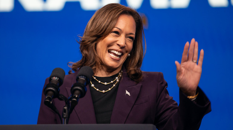 Kamala Harris waving and laughing