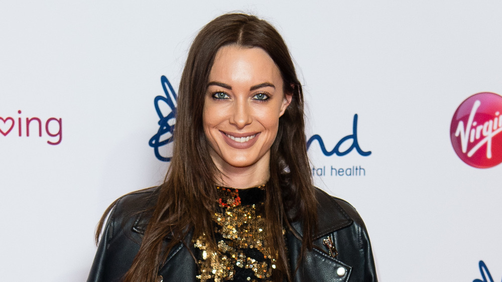 Emily Hartridge on a red carpet 