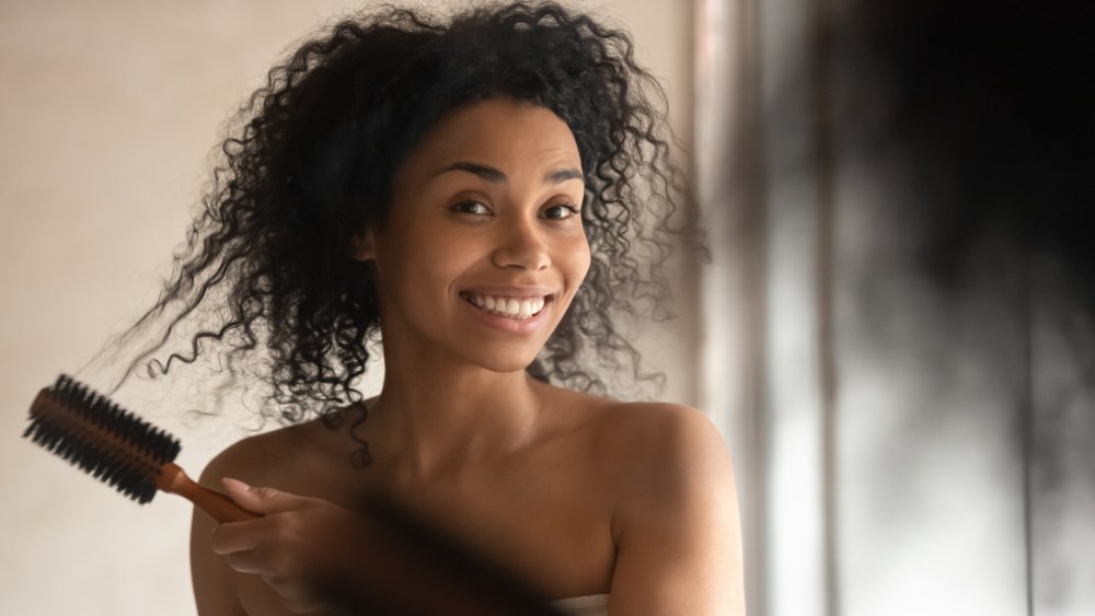 Woman brushing her hair