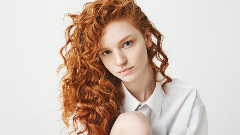 woman with red curly hair