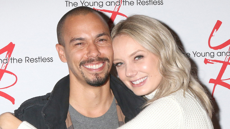 Bryton James and Melissa Ordway smiling