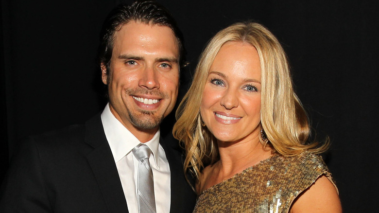 Joshua Morrow and Sharon Case smiling