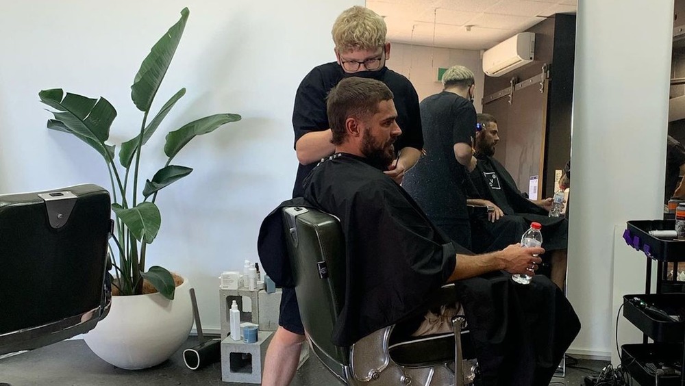 Zac Efron getting a haircut